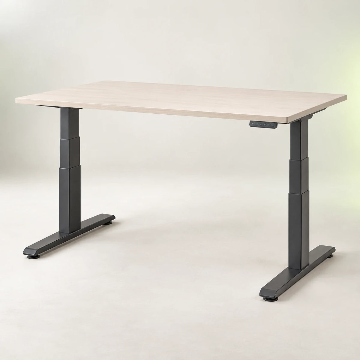 Electric standing desk with a pale desktop and charcoal adjustable legs
